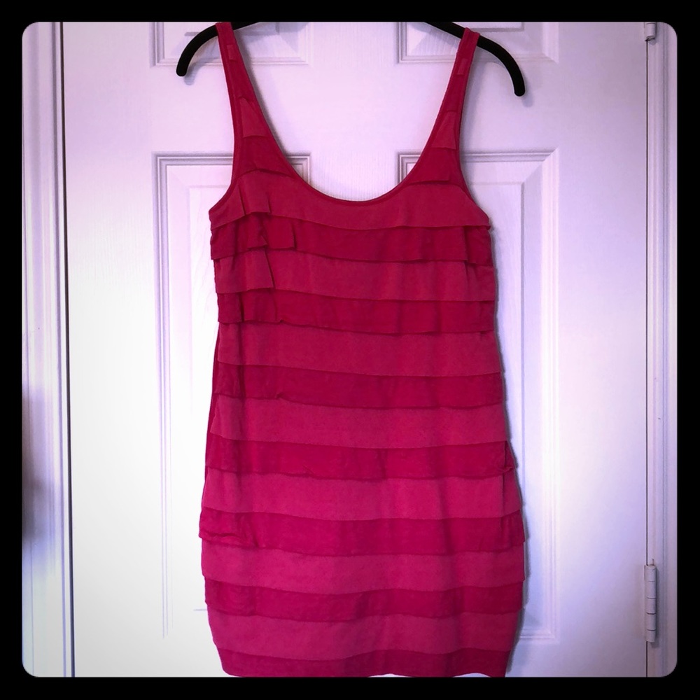 Long pink ruffled jumper.